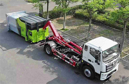 Hook arm garbage truck